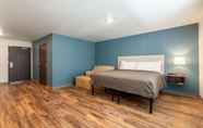 Bedroom 7 WoodSpring Suites Sanford North I-4 Orlando Area