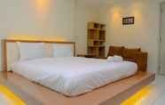 Kamar Tidur 5 Pleasant Studio Apartment at City Home MOI