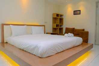 Kamar Tidur 4 Pleasant Studio Apartment at City Home MOI