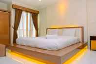 Kamar Tidur Pleasant Studio Apartment at City Home MOI