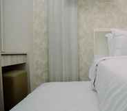 Kamar Tidur 4 Best and Gorgeous 2BR Green Bay Apartment