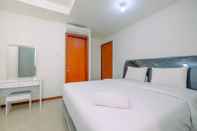 ห้องนอน Cozy and Minimalist 2BR Green Bay Condominium Apartment