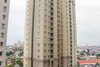 Exterior Homey 2BR Apartment at Grand Palace Kemayoran