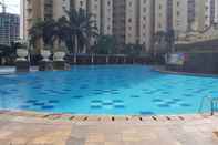 Swimming Pool Comfortable 2BR Apartment at Mediterania Palace Residence
