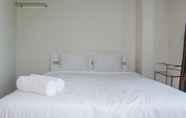 Bedroom 2 Homey Studio with City View Apartment @ Puri Orchard