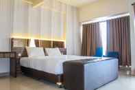 Kamar Tidur Minimalist and Stylish Studio Parkland Avenue Apartment