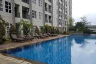 Swimming Pool Simply Furnished and Cozy Living Studio @ Saveria Apartment