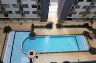 Swimming Pool Modest 2BR Apartment at The Jarrdin Cihampelas