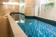 Swimming Pool Comfortable 1BR Apartment at Mustika Golf Residence