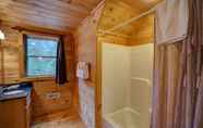 In-room Bathroom 2 Tree Top Getaway Log House with Views | NFL Sunday Ticket Included