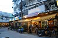 Exterior Yellow Flowers Hostel