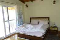 Phòng ngủ Country Holidays Himalayan View Cottages Mukteshwar