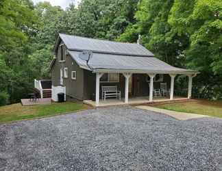 Exterior 2 Cute Above The Creek 1 Bedroom Farmhouse by Redawning