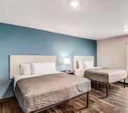Bedroom 4 Woodspring Suites  West Des Moines