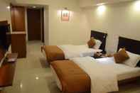 ห้องนอน Hotel Yuvraj