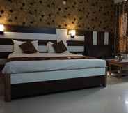 Bedroom 3 Hotel Mani International