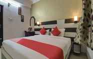 Bedroom 7 Hotel Mani International