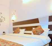 Bedroom 4 Hotel Mani International