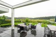 Ruang Umum Luxury Holiday Home in Zeewolde With Garden and Bubble Bath