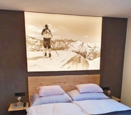 Bedroom 4 Mountain Living Apartments - Ski-In & Ski-Out