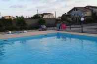 Kolam Renang Lovely Apartment With Pool in Calabria Sleeps 4