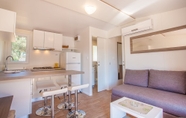 Common Space 5 Mobile Homes Delta at Campsite Lopari