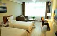 Kamar Tidur 2 Mellow Orange Hotel