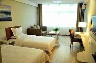 Kamar Tidur 4 Mellow Orange Hotel