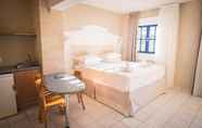 Bedroom 5 Parthenis Hotel & Suites