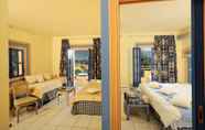 Bedroom 2 Parthenis Hotel & Suites