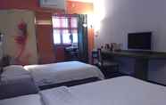 Phòng ngủ 4 Garden Inn Yile Road Branch
