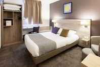 ห้องนอน Brit Hotel Saumur