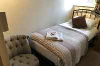 Kamar Tidur Autumn Leaves Guest House