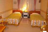 Kamar Tidur Country Inn Milky House