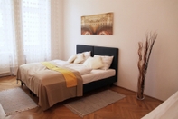 ห้องนอน CheckVienna Edelhof Apartments