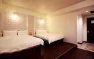 ห้องนอน 2 Traveler Hotel