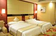 Kamar Tidur 4 Guangzhou River Rhythm Hotel