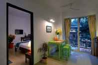 Kamar Tidur Treehouse Blue Hotel & Serviced Apartments