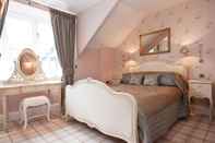 Bedroom Bowness Bay Suites - Adults only