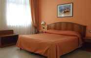 Kamar Tidur 2 Piccolo Hotel