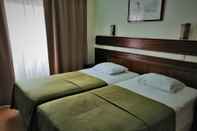 ห้องนอน Hotel Moinho de Vento