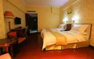 Kamar Tidur 4 Guangzhou Meigang Hotel