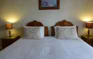 Kamar Tidur 5 The Uplands Serviced Apartments