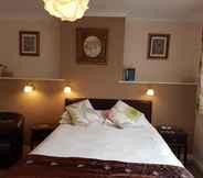 Kamar Tidur 5 Penryn Guest House