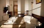 Kamar Tidur 6 Filoxenia Hotel