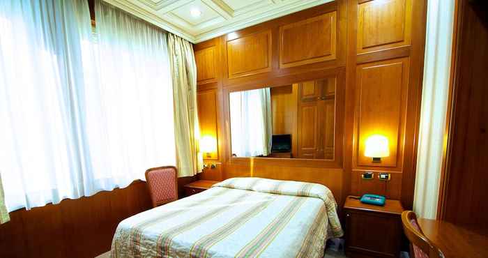 ห้องนอน Hotel Dock Suites Rome