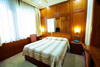 Kamar Tidur 4 Hotel Dock Suites Rome