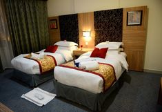 Bedroom 6 Rose Garden Hotel
