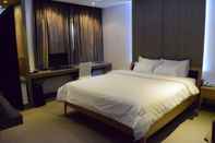 ห้องนอน Suwon Reve Hotel