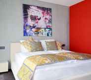 Bedroom 5 Hotel Swiss Star
